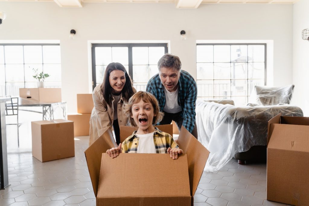 a family having fun after moving in